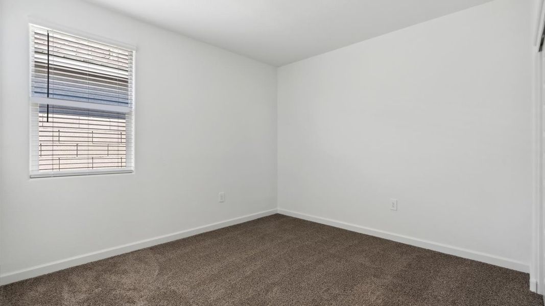 Spacious, unfurnished interior of a new home in Radiance at Superstition Vistas, Apache Junction (Image 20).