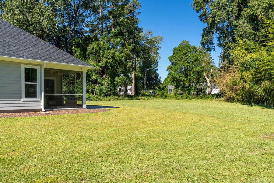 Exterior details and patio area of a home in The Bluffs at Lake Waccamaw, Lake Waccamaw (Image 25).