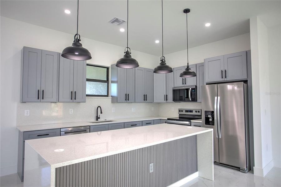 Furnished interior view inside a new home in , Port Charlotte (Image 7). Furnished interior view inside a new home in , Port Charlotte (Image 7).