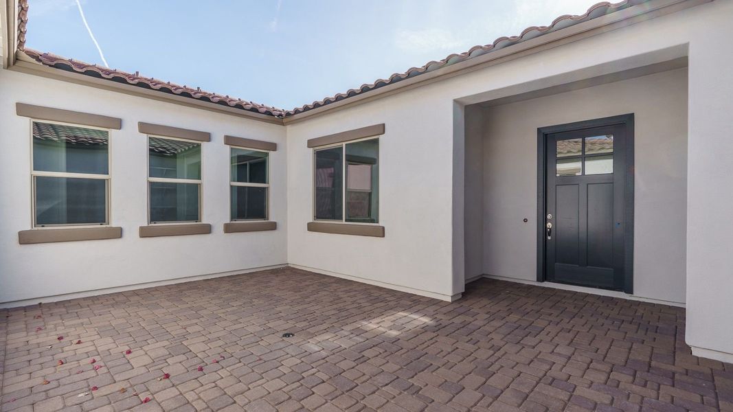 Exterior details and patio area of a home in Harmony at Montecito in Estrella, Goodyear (Image 4).