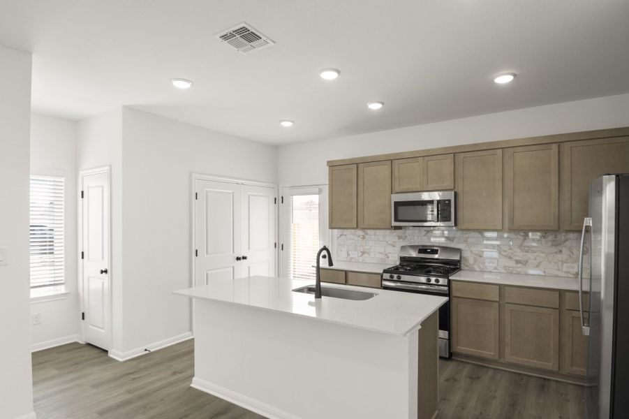 Furnished interior view inside a new home in Trace, San Marcos (Image 15).