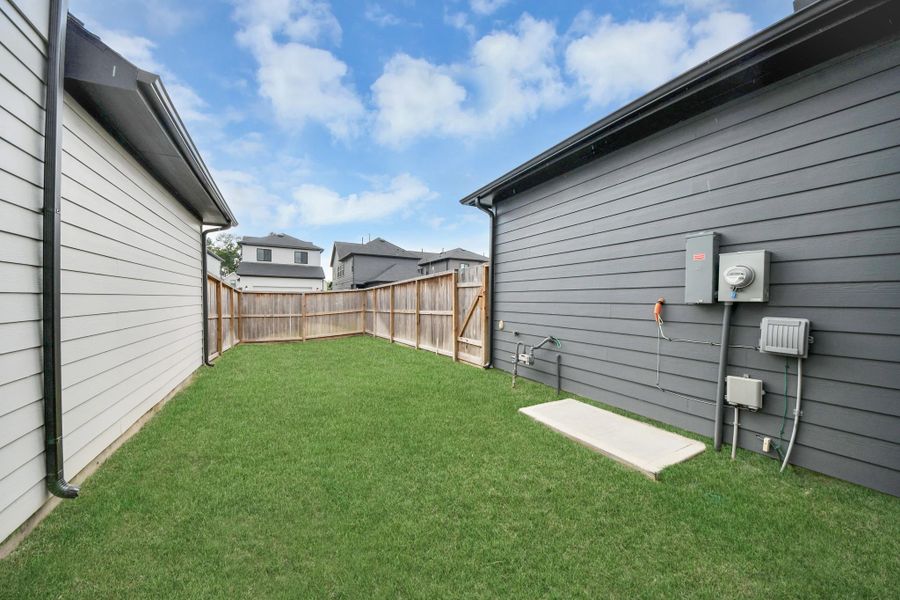 Exterior details and patio area of a home in The Groves 35', Humble (Image 33). Exterior details and patio area of a home in The Groves 35', Humble (Image 33).
