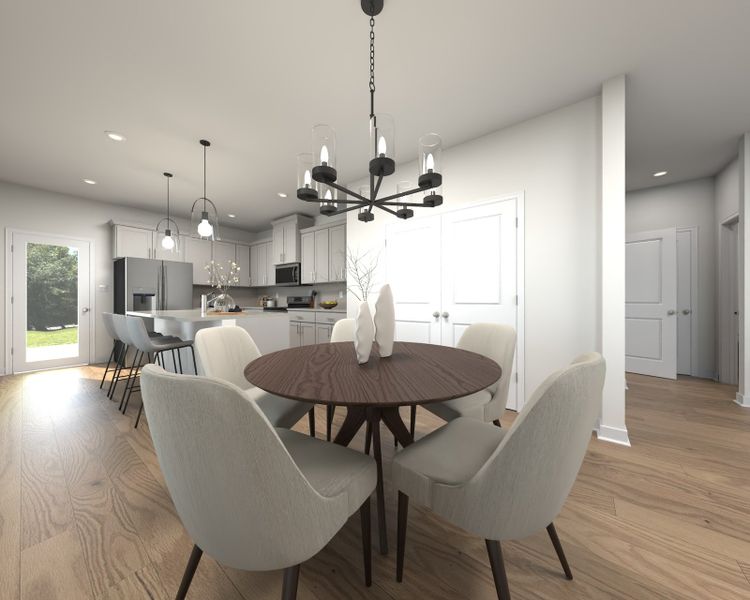 The open-concept floorplan allows for an easy flow between the kitchen and dining areas.