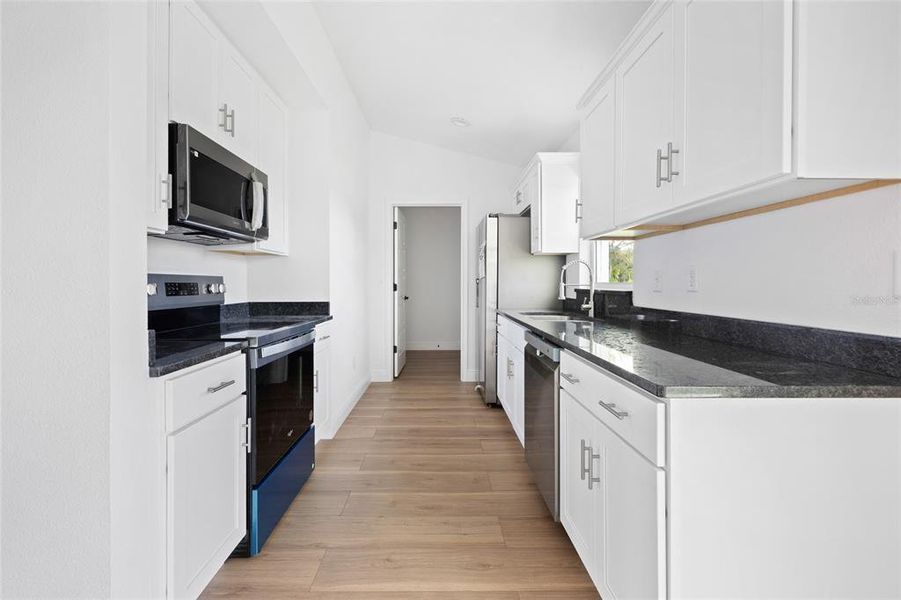 Furnished interior view inside a new home in , Dunnellon (Image 3).