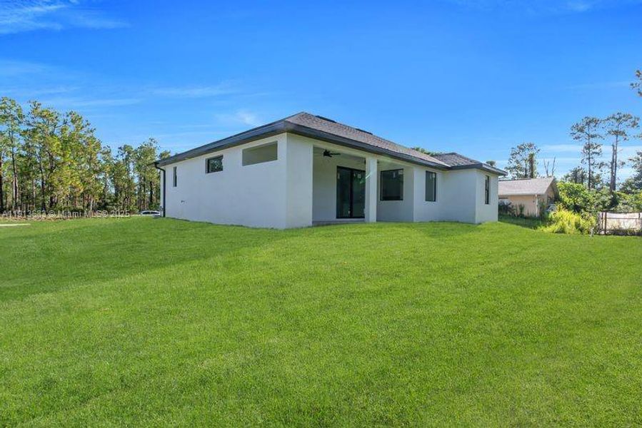 Exterior details and patio area of a home in , Lehigh Acres (Image 3).