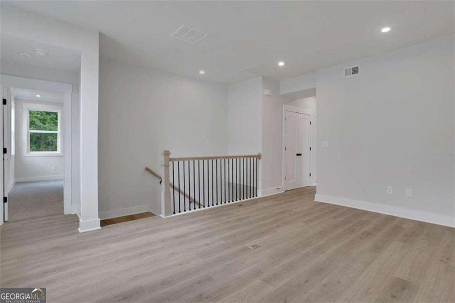 Spacious, unfurnished interior of a new home in The Paddocks at Doc Hughes, Buford (Image 26). Spacious, unfurnished interior of a new home in The Paddocks at Doc Hughes, Buford (Image 26).