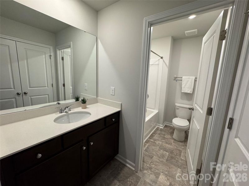 Furnished interior view inside a new home in McFarland Estates, York (Image 6).