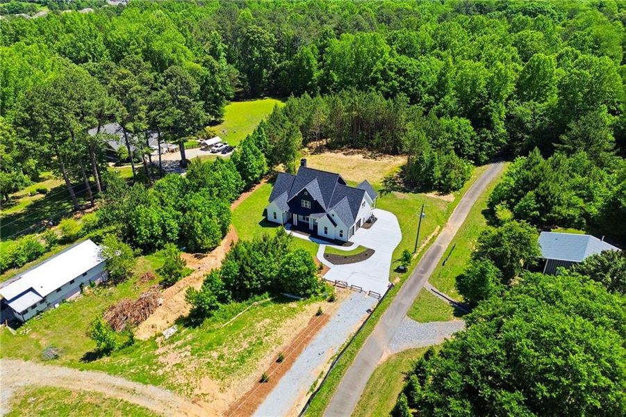 Front exterior of a new home in , Cumming, GA, highlighting curb appeal (Image 33).