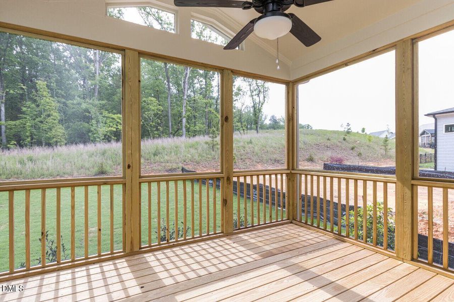 Picture of similar backyard. Wdded view.