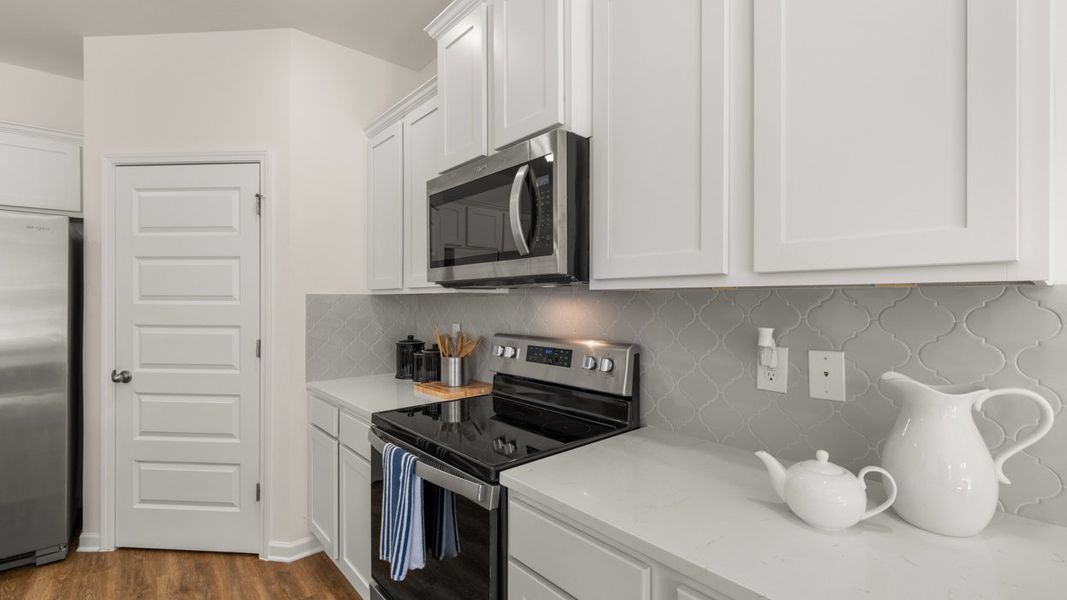 Representative furnished interior of a home built from the Hayden by D.R. Horton in The Reserve at Calcutta, Stockbridge (Image 5).
