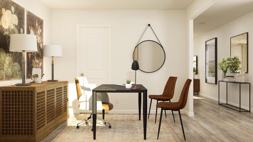 A room with a table and chairs.