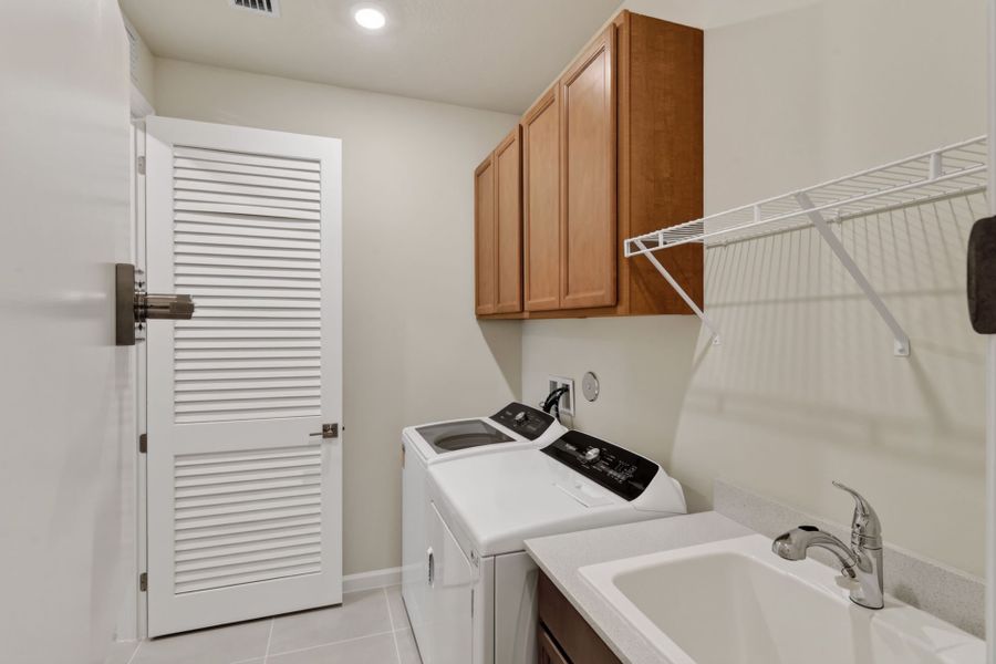 Furnished interior view inside a new home in Del Webb Tradition, Port St. Lucie (Image 11).