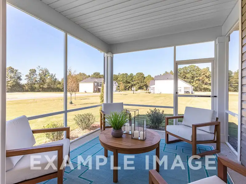 Exterior details and patio area of a home in Retreat at North Main, Lillington (Image 3).