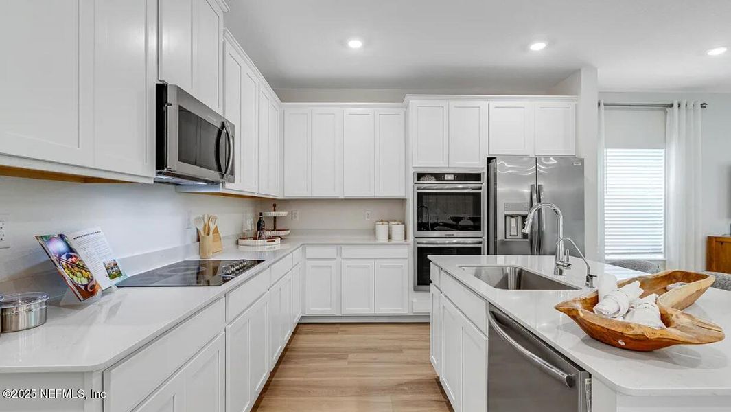 Furnished interior view inside a new home in Russell Retreat, Green Cove Springs (Image 9).