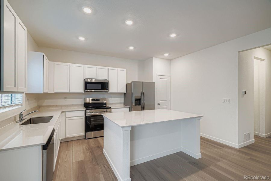 Furnished interior view inside a new home in Eastcreek Farm: The Camden Collection, Thornton (Image 3).