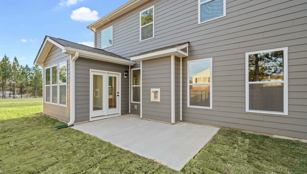 Exterior details and patio area of a home in Arrowood Acres, Enoree (Image 3).