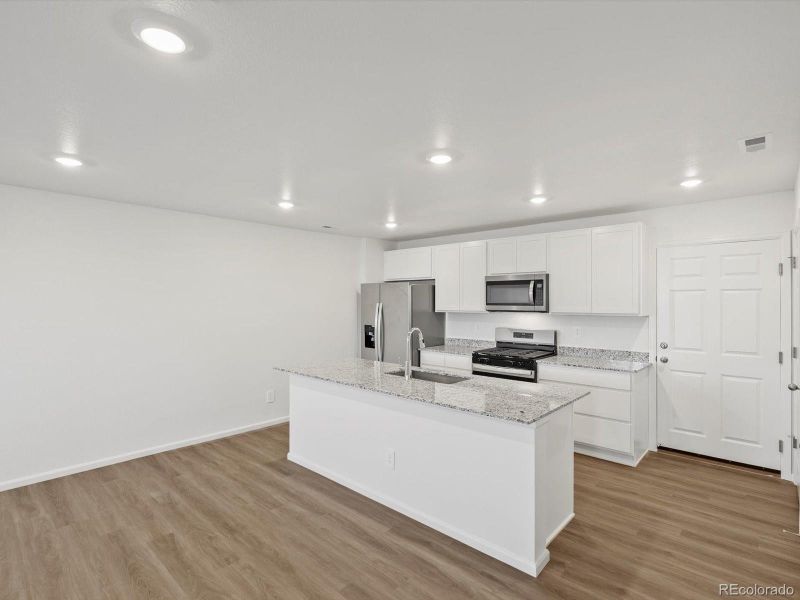 Furnished interior view inside a new home in Skyview at High Point, Aurora (Image 6).