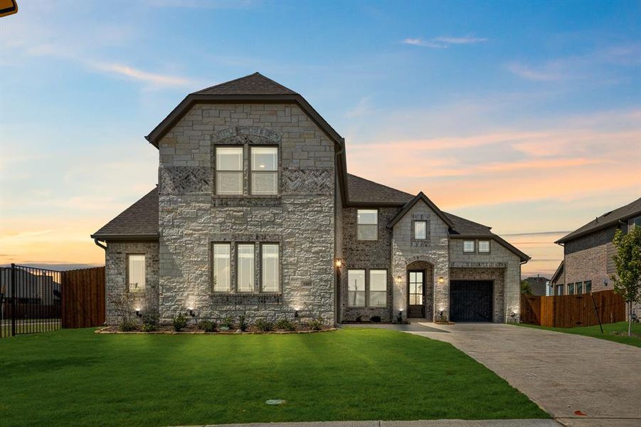 Front exterior of a new home in Mockingbird Heights Classic 60, Midlothian, TX, highlighting curb appeal (Image 24).