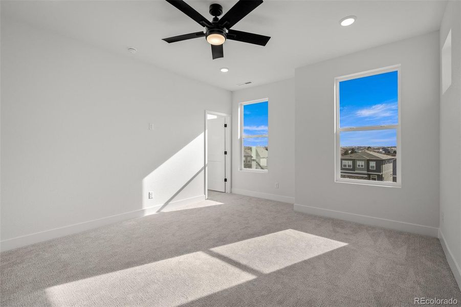 Spacious, unfurnished interior of a new home in Trailside at Cottonwood Creek, Colorado Springs (Image 24).