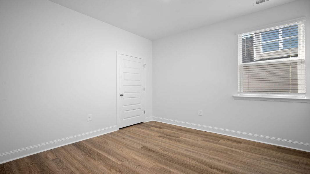 Spacious, unfurnished interior of a new home in The Lakes at North Glynn, Brunswick (Image 21).