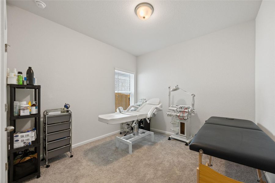 Furnished interior view inside a new home in Mill Creek Trails, Magnolia (Image 5).