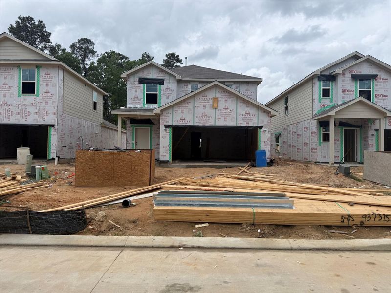 In-progress construction of a new home in Lakes at Black Oak, Magnolia, TX (Image 19).