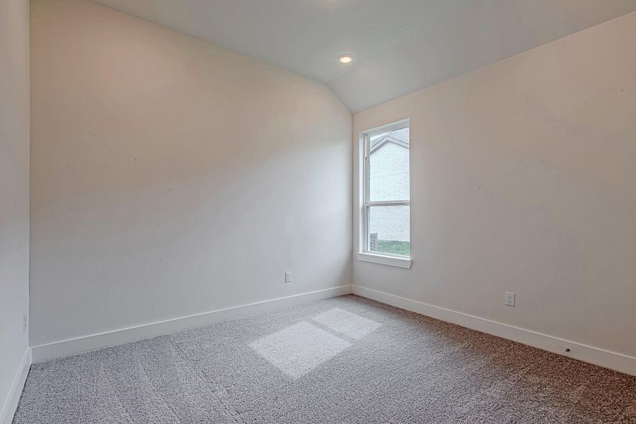 Another spacious secondary bedroom, brightened by a tall window and elevated ceilings—comfortably versatile and ready for your touch. Another spacious secondary bedroom, brightened by a tall window and elevated ceilings—comfortably versatile and ready for your touch.