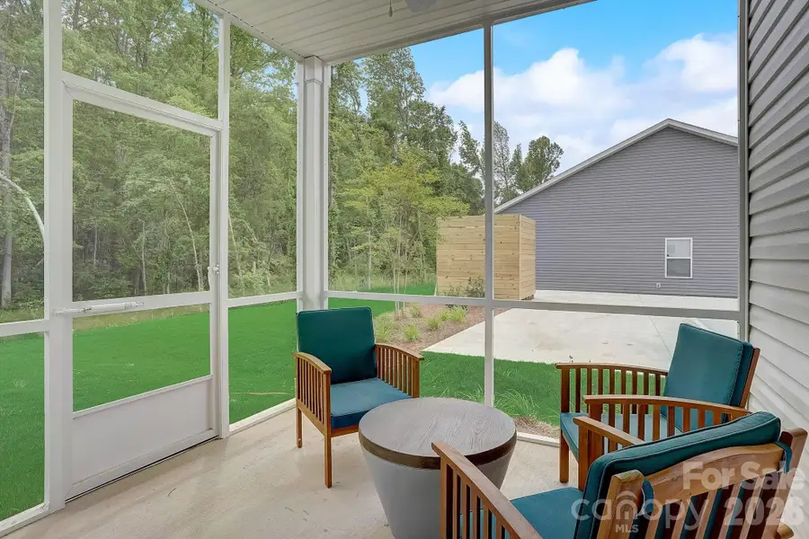 Exterior details and patio area of a home in Country Club Village, Salisbury (Image 3).