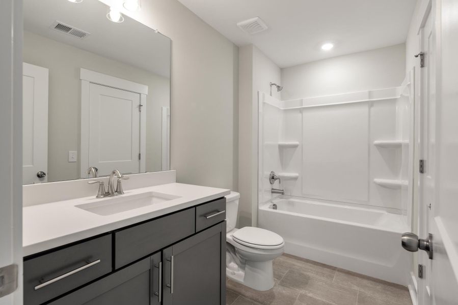 Furnished interior view inside a new home in Academy Park, Beaufort (Image 11).