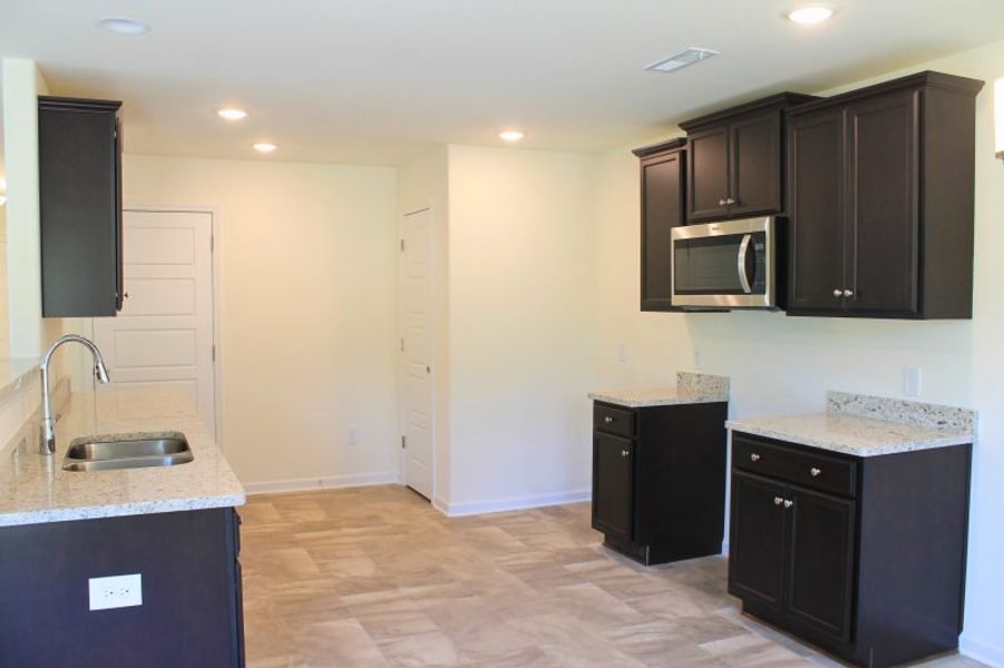 Furnished interior view inside a new home in The Wilcox, Greensboro (Image 5). Furnished interior view inside a new home in The Wilcox, Greensboro (Image 5).