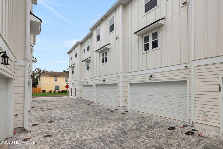 Exterior details and patio area of a home in North Beach Townhomes, Jacksonville Beach (Image 3).