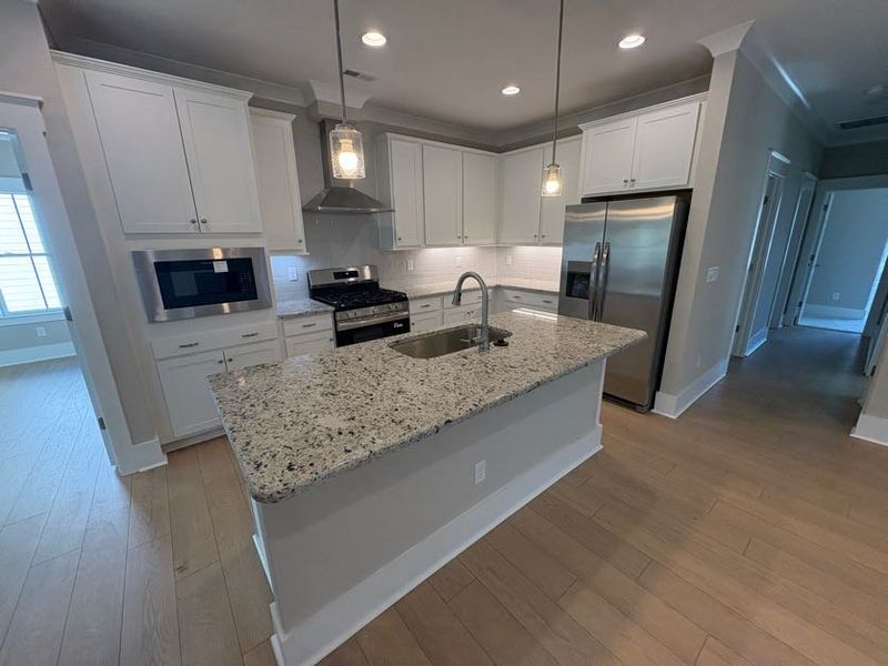 Furnished interior view inside a new home in Riverside Cove, Wilmington (Image 7). Furnished interior view inside a new home in Riverside Cove, Wilmington (Image 7).