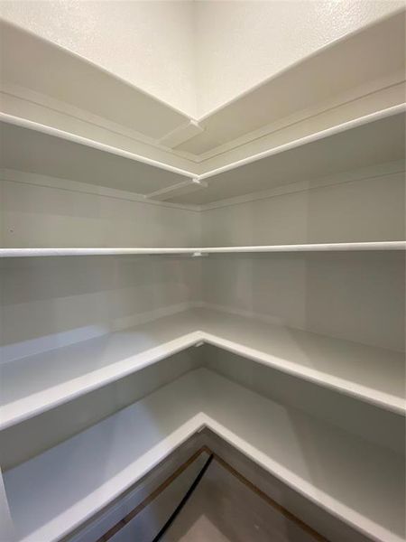 Huge corner pantry offers lots of storage Huge corner pantry offers lots of storage