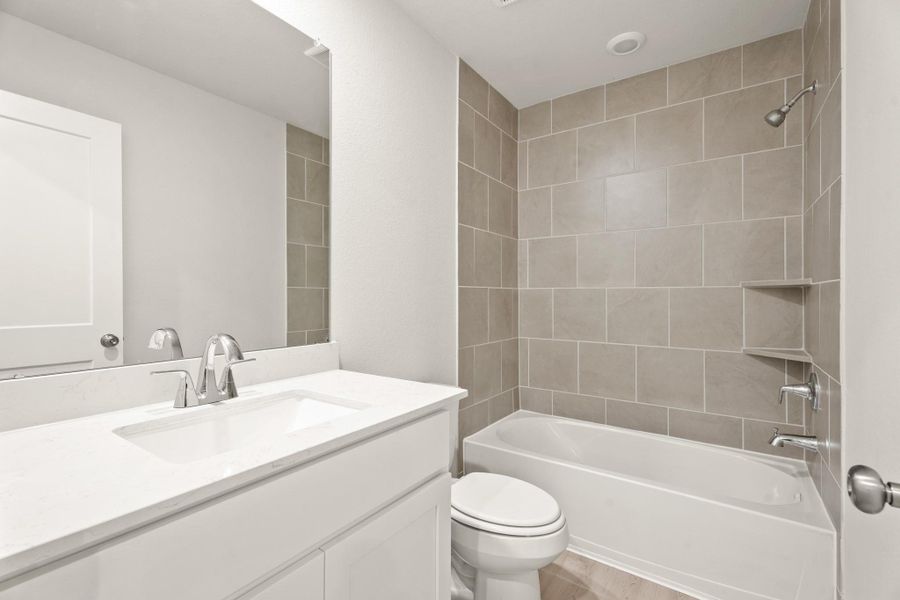 Furnished interior view inside a new home in Trails at Woodhaven, La Marque (Image 13).