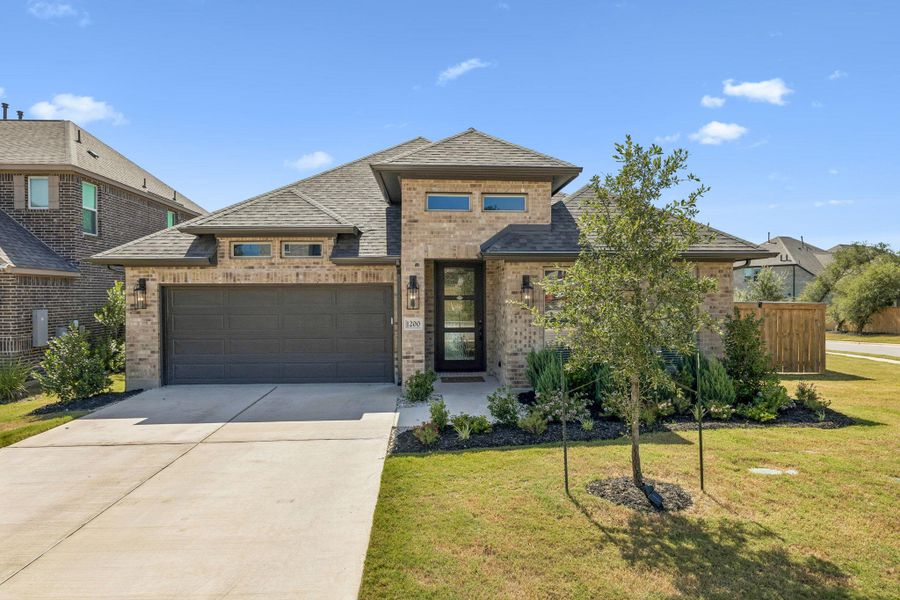 Front exterior of a new home in , Georgetown, TX, highlighting curb appeal (Image 22). Front exterior of a new home in , Georgetown, TX, highlighting curb appeal (Image 22).