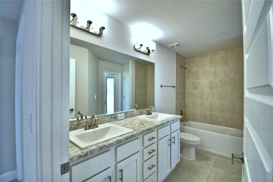 Furnished interior view inside a new home in Cadence Crossing, Auburndale (Image 14).