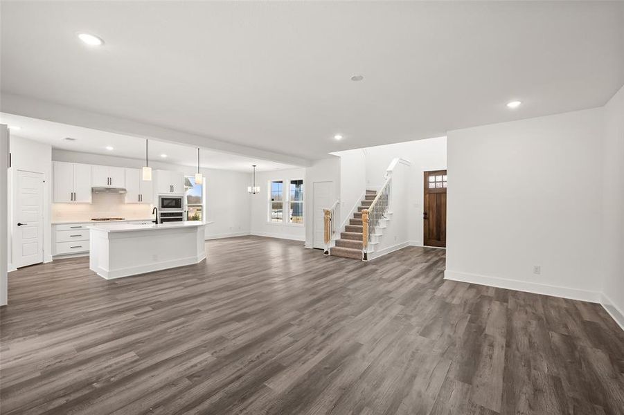View of kitchen and dining from the living area