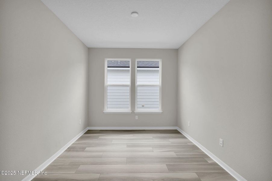 Spacious, unfurnished interior of a new home in Del Webb Wildlight, Yulee (Image 23).