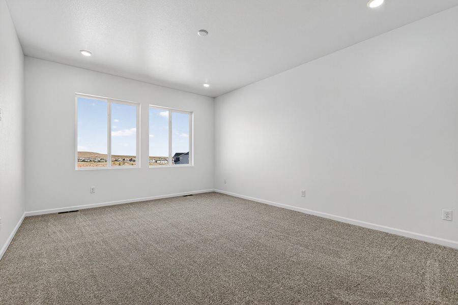 Spacious, unfurnished interior of a new home in Trailstone, Arvada (Image 19).