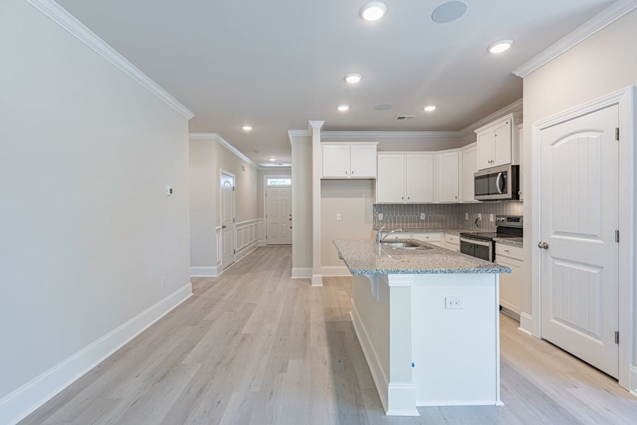 Representative furnished interior of a home built from the Habersham II by Great Southern Homes in Old Charleston Acres, Pelion (Image 7).
