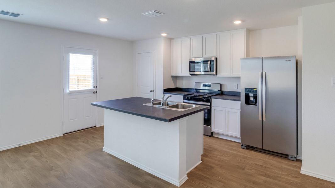 Furnished interior view inside a new home in Prairie Lakes, Buda (Image 3).