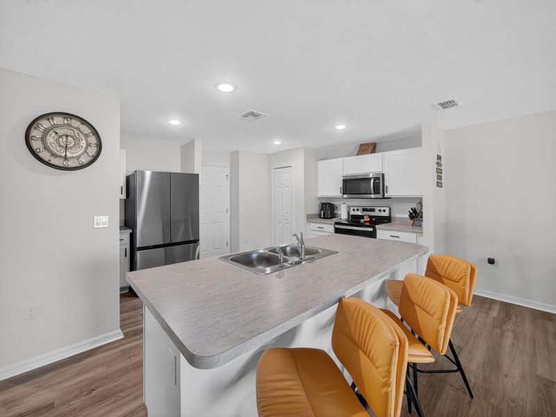 Furnished interior view inside a new home in , Port St. Lucie (Image 10).