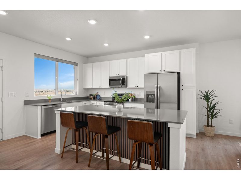 Furnished interior view inside a new home in Whisper Village, Arvada (Image 18).