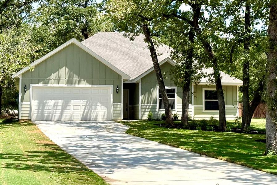 Front exterior of a new home in , Lake Kiowa, TX, highlighting curb appeal (Image 1).