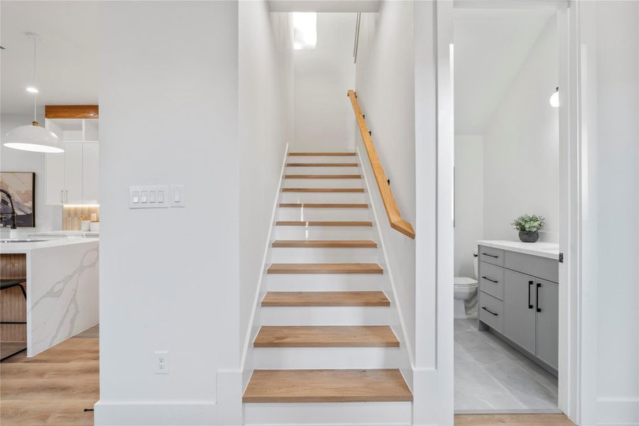 Tucked discreetly near the entrance, the staircase leads you to second-floor living, creating a sense of separation and flow throughout the home Tucked discreetly near the entrance, the staircase leads you to second-floor living, creating a sense of separation and flow throughout the home