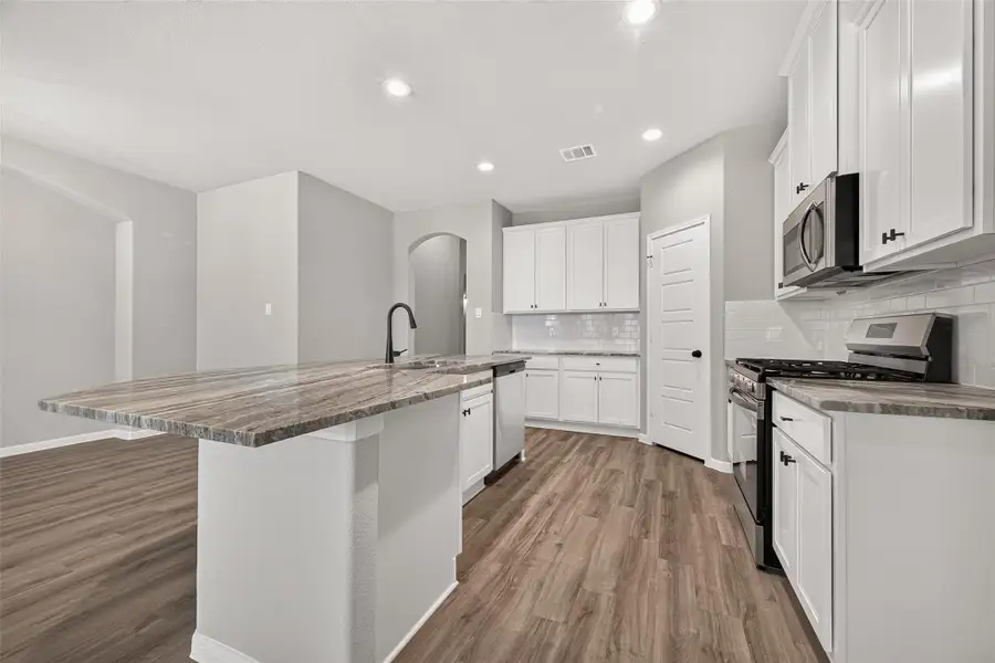 Furnished interior view inside a new home in , Angleton (Image 15).