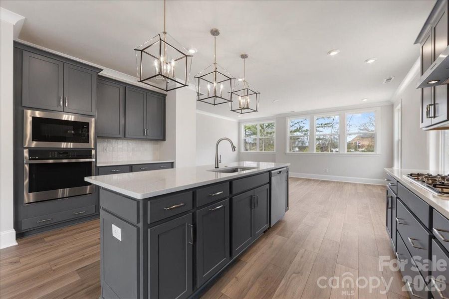 Furnished interior view inside a new home in Ross Farms, Charlotte (Image 9).