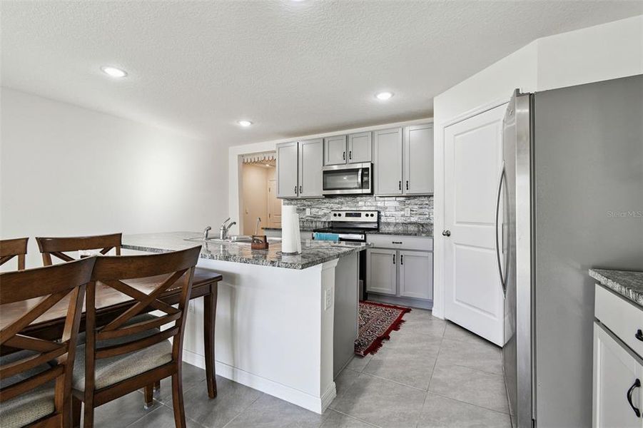 Furnished interior view inside a new home in River Park, Temple Terrace (Image 9).