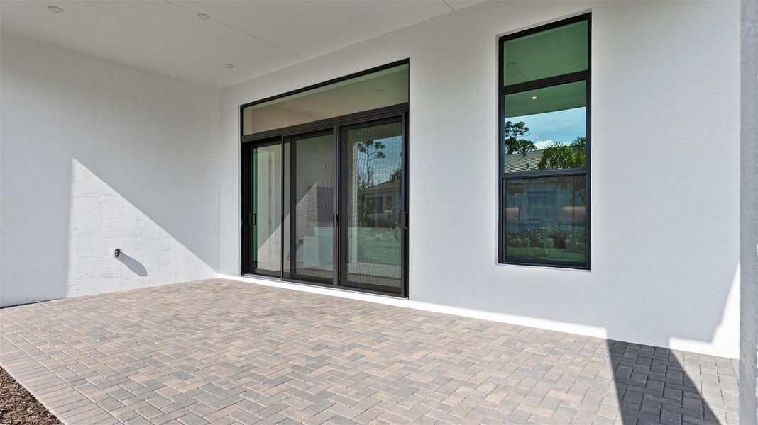 Exterior details and patio area of a home in Cove Royale, Stuart (Image 3).