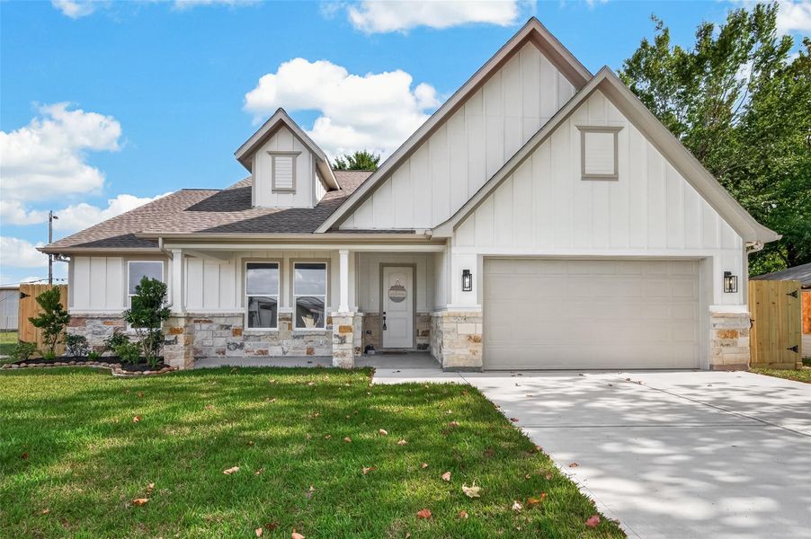 Front exterior of a new home in , Deer Park, TX, highlighting curb appeal (Image 16).